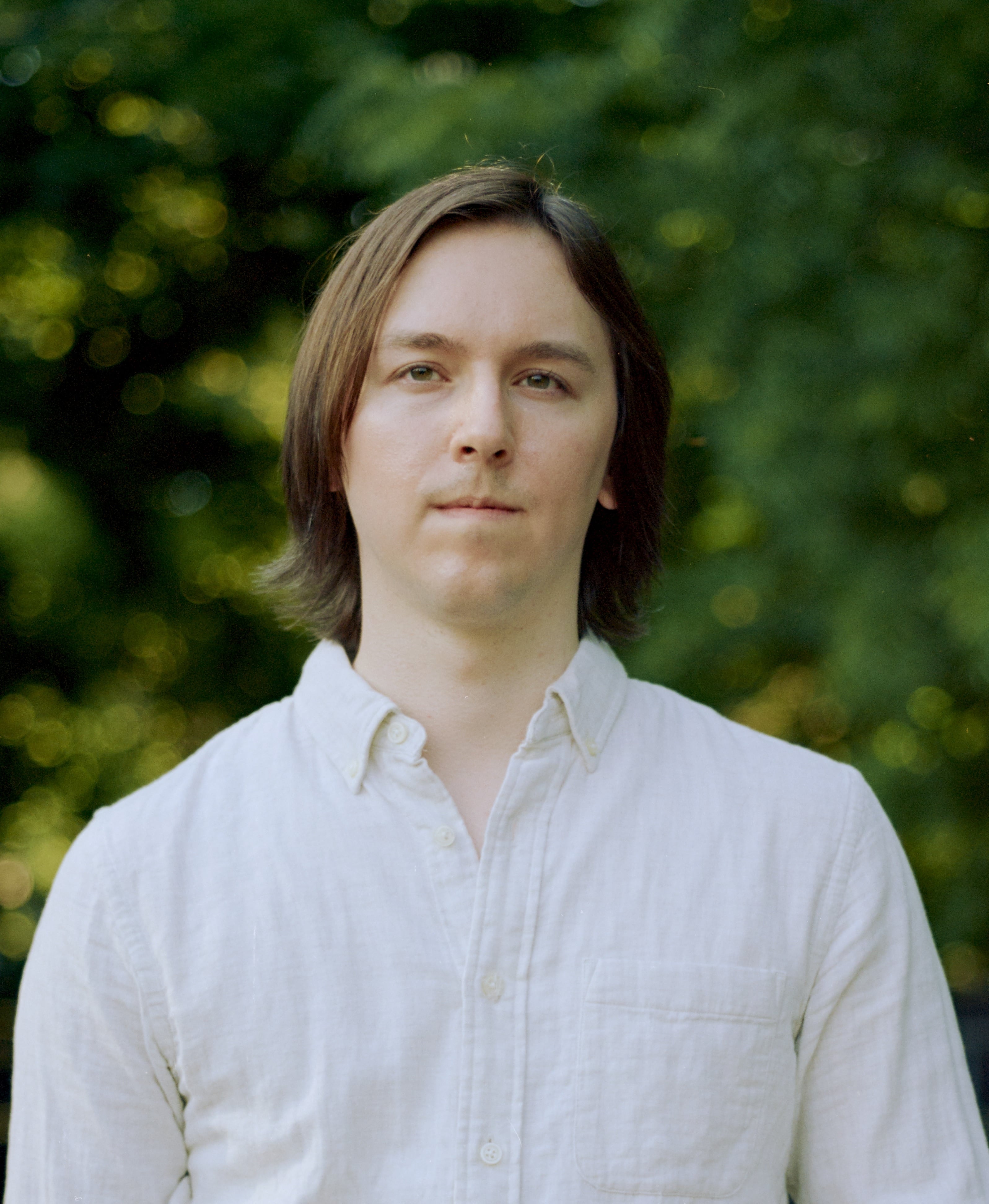 A headshot of the web developer, Adam Batstone